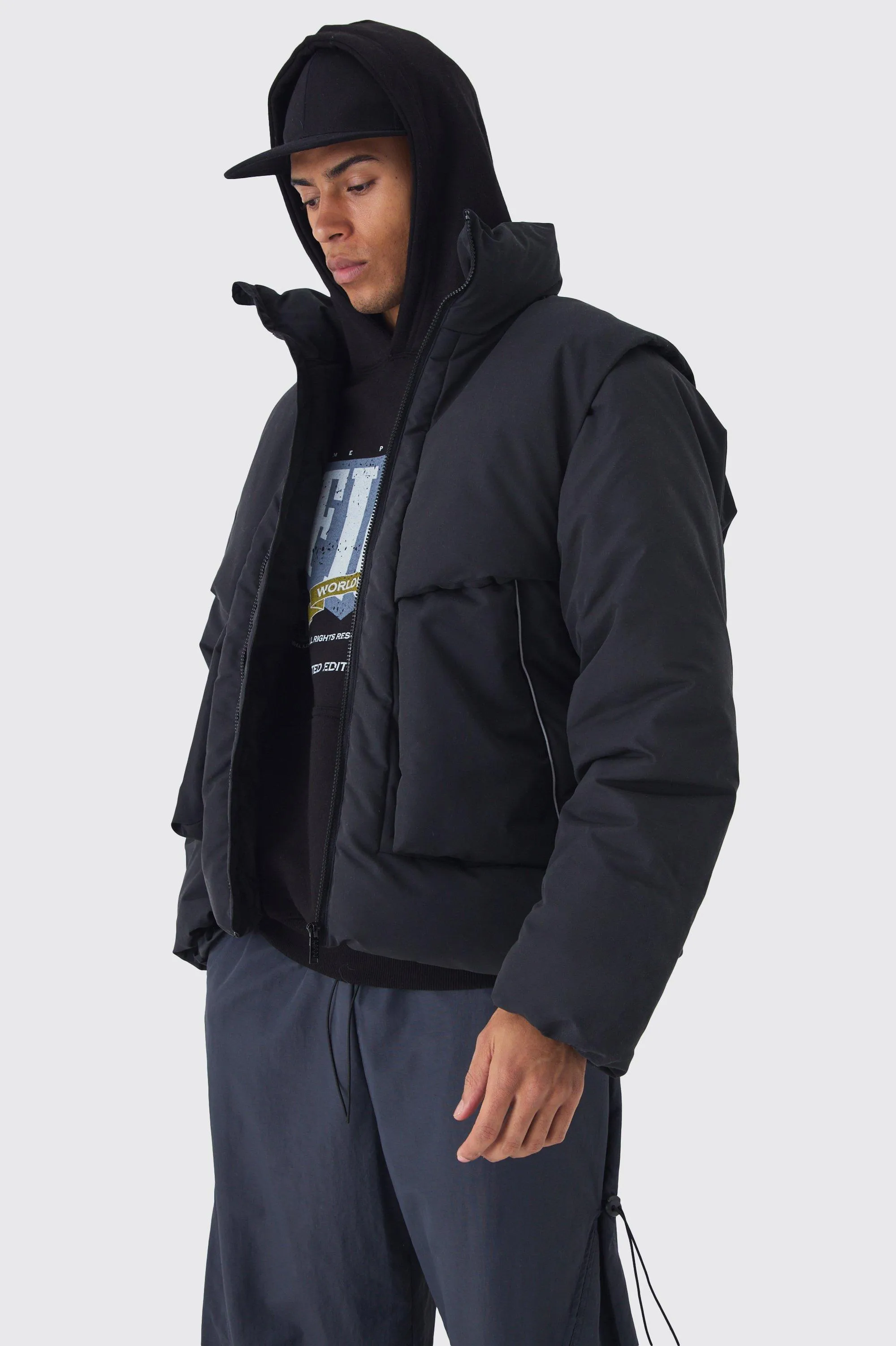 Funnel Neck Puffer Jacket With Removeable Sleeves In Black